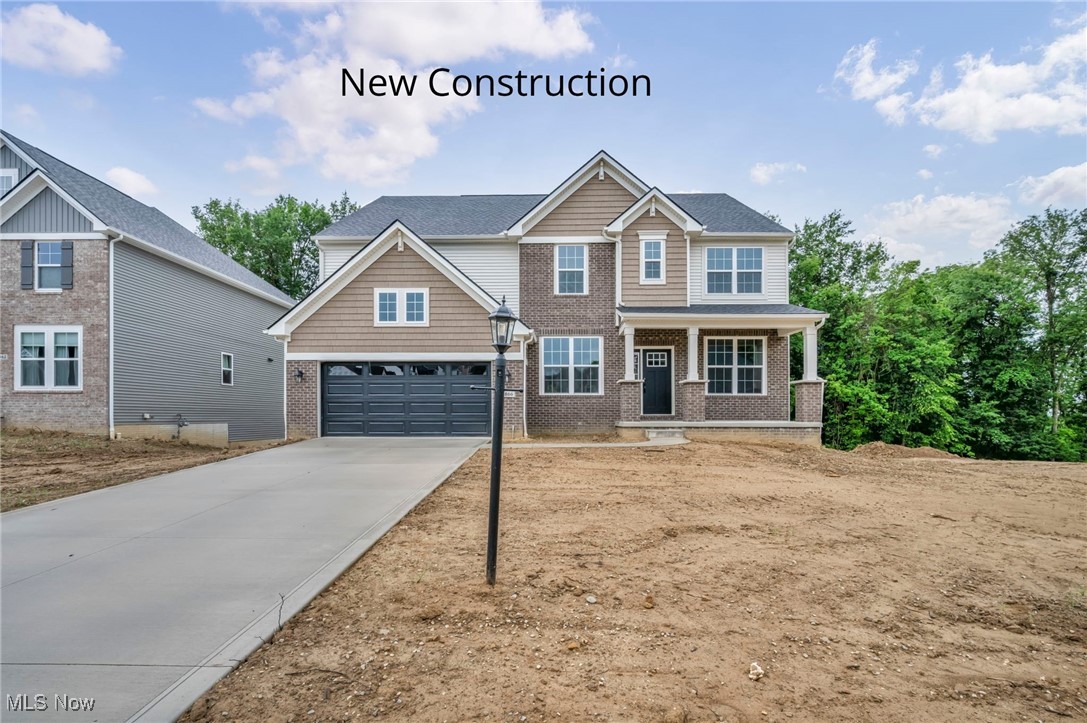 New construction ready for move in July 2025! Popular Buchanan plan in highly desired Windfall Estates. Located in the highly rated, very desirable Highland School District and Montville Township. Located minutes from I-71 in Medina County with easy access to Medina, Akron, Cleveland and adjacent to Thomas Currier Nature Park. This home offers a grand, 2-story family room with coffered ceiling and stone fireplace from floor to ceiling. Open kitchen with burlap cabinets, quartz countertops, SS appliances along with formal dining room for additional entertaining space. The home office is enclosed with double doors for added privacy. The rear staircase leads to 4 generous sized bedrooms with walk in closets. Double doors lead into primary suite with designer tile shower, granite countertops and spacious closet. The first floor includes upgraded luxury vinyl plank along with upgraded Kichler lighting. The unfinished, walkout basement is an open canvas for future living/entertaining needs. Finally, the 3-car tandem garage is a bonus. This home is a must see!