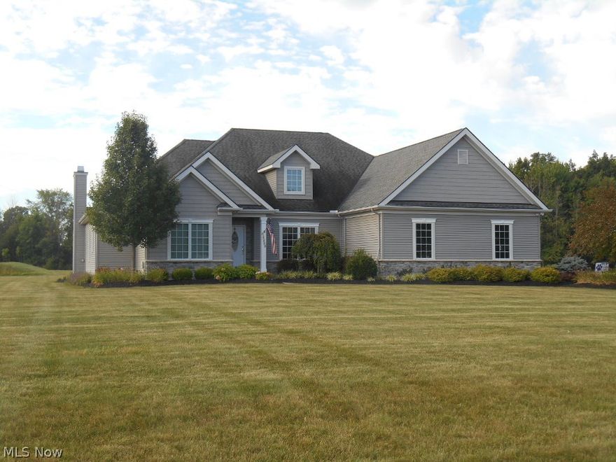 This one owner custom built ranch home is just 9 years young, 2762 SqFt and is situated on a 2.4 acre lot on a private dead-end street. A few of the amenities are 9' ceilings, Pella windows, Moen faucets, geothermal heating and cooling, solid 6 panel interior doors, oak trim throughout, 1st floor laundry room, in-ground sprinkler system, exterior LED lighting, 26x30 stone patio and a 3 car attached heated garage with 220 electric. The custom kitchen features all stainless appliances, an island, granite countertops and a ceramic tile floor. French doors lead to the dining room with a tray ceiling and hardwood floors. The large master suite has a huge bathroom with dual sinks, Corian countertop, jetted tub, shower and a large walk-in closet. The great room is open to the kitchen/eating area with coffered ceiling and a wood burning fireplace. The basement has a second entrance from the garage with an office, bedroom, huge bathroom, unfinished extra room and has lots of room to finish a re
