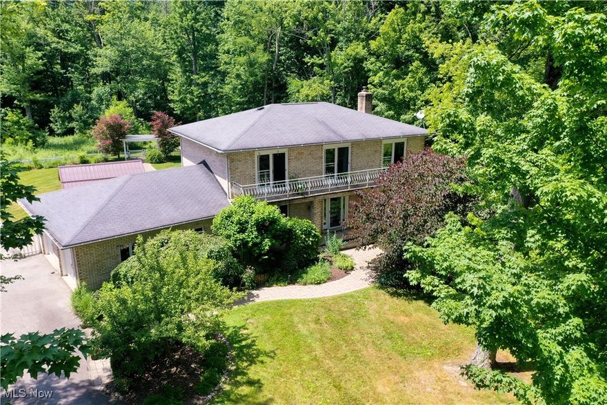 Welcome to your dream home nestled on a serene, quiet street! This completely updated home boasts a sprawling 4-acre property with an immaculate yard featuring a charming pavilion, inviting firepit, and classic white picket fence. Inside, you'll find a cozy yet spacious layout with three bedrooms, two and a half baths, including an owner's suite with glamour shower, ceramic tile, and quartz counters for your utmost comfort. The partially finished basement offers additional flexible living space ideal for a home office or hobby room. Convenience is key with a two-car attached garage and an additional two-car detached garage providing ample storage for all your vehicles, tools, outdoor gear, and more! Additional features include bamboo flooring throughout, newer windows, newer hot water tank, and newer wood burning insert.