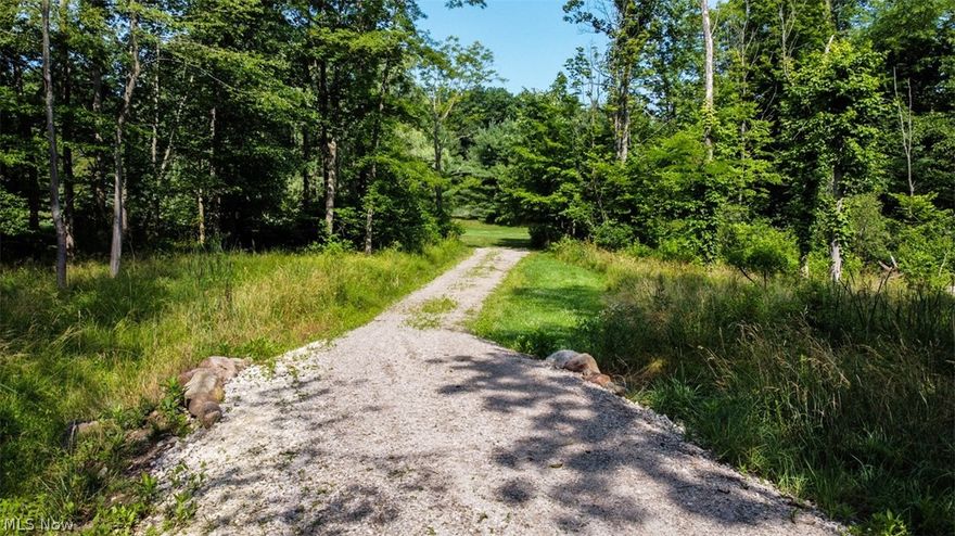 Now is your chance to build a beautiful home on this sought after street!...3.21 acres with pond and both water and gas available at street!  Soil  for septic evaluation  completed and provided on request.  Gravel driveway will give you an idea of where to start to view lot and please see video attached for aerial views. 3-4 bedroom is the perfect size for this lot.  Septic is 50' setback from pond required and 10' setback from small stream by road and property boundary lines..  A state of the art peat moss septic system will cost between $20-25K.