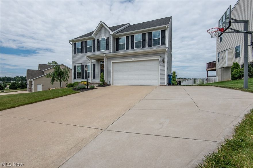 BEAUTIFUL 4 BED 2.5 BATH COLONIAL IN PLAIN LOCAL SCHOOLS! When you walk through the front door, you will immediately feel right at home and will fall in love with the neutral decor throughout. The front living area offers lots of windows that bring in tons of natural light, making this room feel extra cozy and relaxing. Walk into the two-story great room with a gas fireplace which is open to the kitchen where you will find dark hardwood floors, lots of cabinets, plenty of counter space, a large island, a nice sized pantry and appliances that stay with the home. The morning room sits off of the kitchen and provides access to the deck overlooking the backyard. The second-floor master suite offers a walk-in closet, and a full master bath with a soaker tub, stand up shower, double vanity, and laminate flooring. Each additional bedroom features neutral decor, carpet, and white mission style doors throughout. The full bath on the second level features a double vanity, tub/shower combo, and l