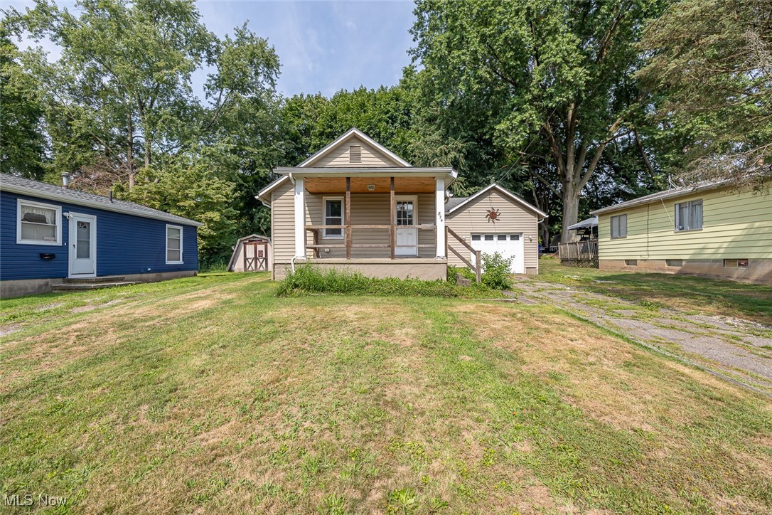 Welcome to 874 Nevin Street, a charming 2-bedroom, 1-bath ranch-style home nestled in Akron’s Sunnyside neighborhood. Situated on a spacious 0.17-acre lot, this inviting residence features a functional layout with a bright dining area, a well-equipped kitchen including modern appliances, and an office space perfect for remote work or study. Enjoy the convenience of central air conditioning and forced air heating throughout. The home offers an attached one-car garage and a basement, providing ample storage or potential for customization. Located close to local amenities, this home is an excellent opportunity for first-time buyers or investors looking to add value. Schedule your showing today to see the potential this home holds!