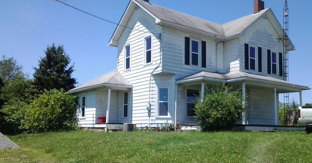COUNTRY LIVING awaits you at this farmhouse that sits on 2.86 acres on a quiet, paved county road in East Guernsey Local School District. A classic 2-story building style with a covered front porch that welcomes you into the 1452 SqFt of living space with 3 bedrooms, one full bath, a spacious living room, an eat-in kitchen as well as a dining room. Beautiful original woodwork throughout. The walk-out basement has laundry hook-ups. This home has FREE GAS as long as source provides. Updates include: New carpet and windows in 2019, New electrical in 2020, New heat pump 2020, New roof in 2022, and New hot water tank in 2023.
Don't let the opportunity to get out in the countryside pass you by! Call for your personal tour today!
Property is being sold "as-is".