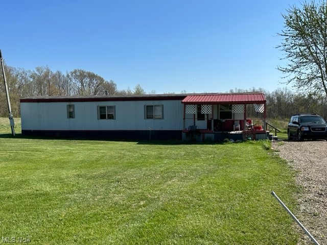 Opportunity knocking...! This investment property has 4 single mobile homes producing $1600 gross per month combined. They set upon 10 beautiful acres on nice quiet Lane and has a stock pond with dock.