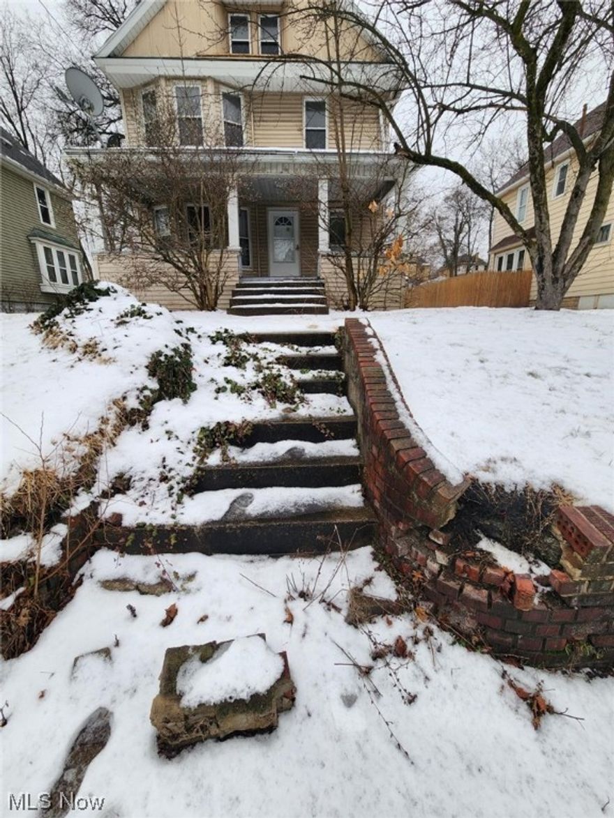 Born in 1908 this beauty needs a little imagination and elbow grease to bring back to that Highland Square charm.  Every room is large and back yard is tiered and waiting for landscaping ideas.