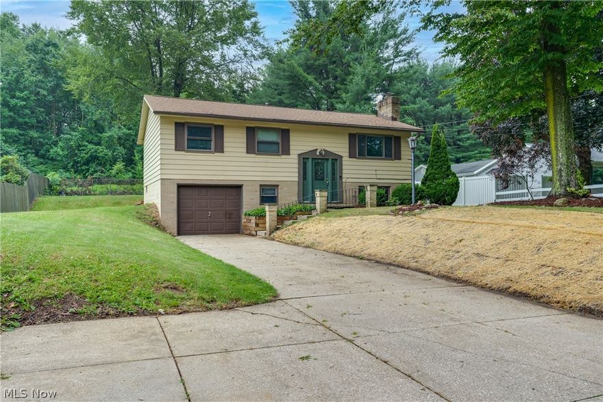 If you are looking for an affordable and spacious single family home in Norton, look no further! This home features 3 bedrooms, 1.5 baths, and a spacious lower level family room with a wood-burning fireplace with Nature Stone throughout.  Enjoy the summer on your large deck overlooking your tranquil backyard.  The best part is...it's priced to sell! With a little love and creativity, you could truly have fun making this home your own.