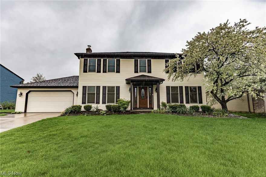 Beautifully updated 4 bedroom Colonial with 3.5 bathrooms, finished basement & amazing backyard to enjoy! Fresh paint & all new flooring throughout! Conjoined living room & dining room perfect for formal gatherings. Elegant eat-in kitchen showcasing updated appliances, custom maple cabinetry and granite countertops. Fantastic family room w/ wet bar & cozy fireplace. Convenient, updated 1/2 bath & laundry room complete the main level. Upstairs are 4 sizable bedrooms & 2 updated full bathrooms, featuring the owner's suite w/ private bath. More living space is found in the partially finished basement with sprawling recreation room, 3rd full, remodeled bath & ample storage! You will love spending time outside on the newer composite deck with a full brick walkway/patio surround. Newer roof, windows, siding, Furnace, A/C & recessed lighting in living rooms and family room! You are sure to fall in love! Call today for a private showing!