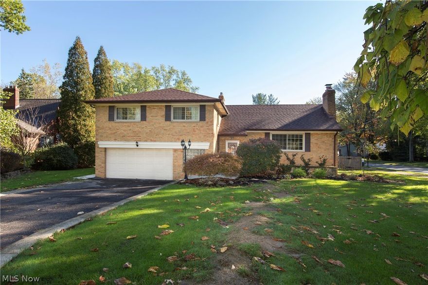 Must see inside this completely renovated & re-modeled split.  Everything updated from top to bottom, This spit has a living room, dining room, family room & a lower level finished recreation room + attic!  Walls were taken out in the kitchen & dining room to give the home a classy newer & open look. Very stylish kitchen w/breakfast bar, stainless appliances, eating area, new pendulum bar lights & all fixtures are new. You will love entertaining in this home w/Everything at your figure tips. Open floor plan allows everyone to enjoy a wonderful atmosphere. Bathroom looks like magazine decor, recently completely remodeled. Decorative pillars on main level. New front door & many many other special touches & surprises will make you fall in love with the home.  You must see inside- with the finished lower level this home is almost 3,000 square feet of living area. Back Patio & back porch area over looking rare half acre fenced in yard, High-end light fixtures, todays colors, hardwood floors