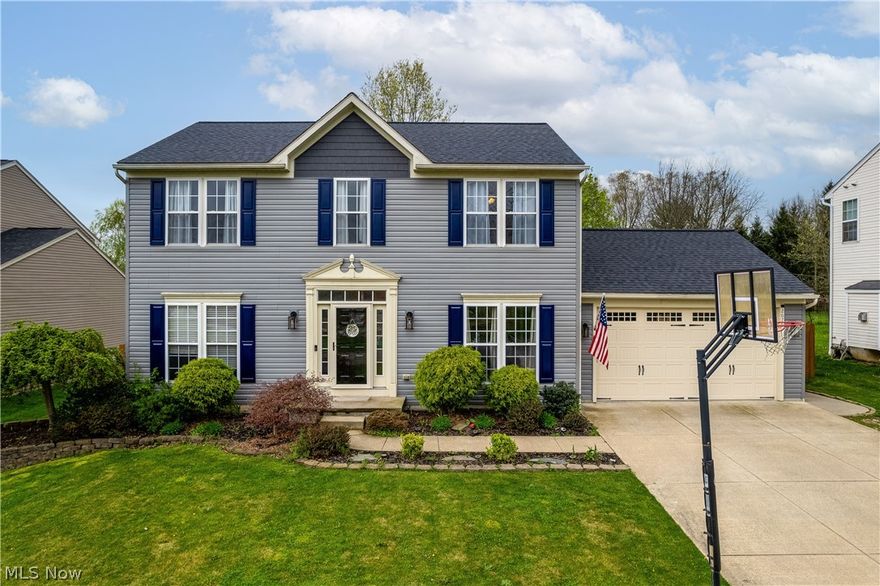 Welcome to 2676 Pinegate Dr Norton ~ All the updates you desire are in this 4-5 bedroom 2.5 bath home.  The open kitchen lends itself to wonderful entertaining and includes granite countertops, beautiful white cabinets, recessed lighting, laminate flooring, breakfast bar and an island.  The family room is complete with new carpeting and an electric fireplace and the dining room/morning room boasts a beautiful chandelier, built-in bar, laminate flooring and many windows to let that sunshine in.  The first floor is completed by an office area, half bath and a bonus room off the kitchen that can be used for a play area, office, craft room, whatever your needs may be.  Your master suite is very spacious and includes a walk-in closet and a beautifully updated full bath with tile shower and double sinks.  Laminate flooring throughout the first floor carries itself to the second floor hallway and into 3 of the 4 bedrooms, the 4th bedroom has been newly carpeted.  The lower level includes a 5th bedroom or office area or craft room and a half bathroom plumbed for shower.  Hoping for an outdoor living area? Just wait until you see the beautiful backyard that is fully privacy fenced and includes a 2 year old pool with solar cover, 2 patio areas one of which includes a pergola, a barbecue area and an area for your firepit.  Updates include roof, siding and hwt new in 2022, high efficiency furnace and a/c have been maintained regularly and ducts were cleaned in 2021.  Sump pump and grinder pump replaced in 2021. The workbench in garage will stay. 2676 Pinegate Dr, Norton does not disappoint!  Schedule your private showing today.