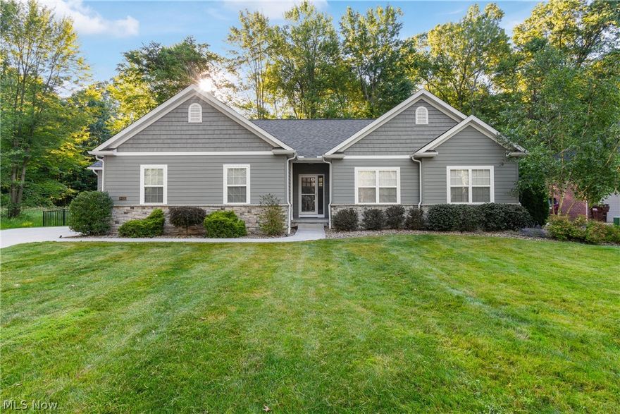 Gorgeous custom built ranch home nestled on a private cul-de-sac in the heart of Jackson Twp. This 3 bedroom, 2.5 bath home with office, sunroom and screened in back porch has a wide open floor plan making it ideal for entertaining or family gatherings. The large family room offers a coffered ceiling, fireplace, and large windows with spectacular views to the private backyard. The well appointed kitchen comes with brand new stainless steel appliances, a working island with seating, walk-in pantry, and dining area which flows to the sunroom which also boasts stunning views of the property with doorways leading to the patio or screened in back porch. There is a drop zone/mudroom off the garage and a large laundry room with sink, hanging area, cabinets, and brand new front load washer and dryer. There are 2 bedrooms, private office/den, and a generously sized owners suite with sitting area and large walk-in closet. This property has dual zone heating and cooling, new interior paint throughout, new carpeting in bedrooms and office, and new landscape lighting. This home has been meticulously maintained and cared for and is ready for its new owner. Please call today to schedule your private showing.