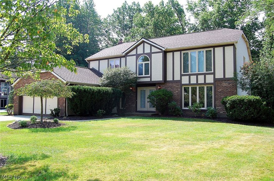 This stately colonial has 3 bedrooms and 2.5 baths with a great floor plan and windows everywhere! Did you see the price?? And in "Woodpath"!!! Haven't you always wanted to live in this great location? Majestic foyer with ceramic tile flooring and spindled staircase.   Soothing neutral tones of carpet & paint accented by natural wood trim and create an elegant palette in the formal living & dining rooms. The bright and open eat-in kitchen is enhanced with easy care tile flooring, pantry and access to the  deck overlooking the wooded view.  Floor-to-ceiling brick fireplace makes for a striking focal point in the adjacent family room with access door to the back patio. The first floor combination laundry and mud room access the spacious garage. Half bath, bonus room and office complete the 1st floor. Spacious master suite boasts a walk-in closet and a master bath with dual sinks a soaking tub and separate shower.   Two additional large bedrooms all with large closets are steps away from