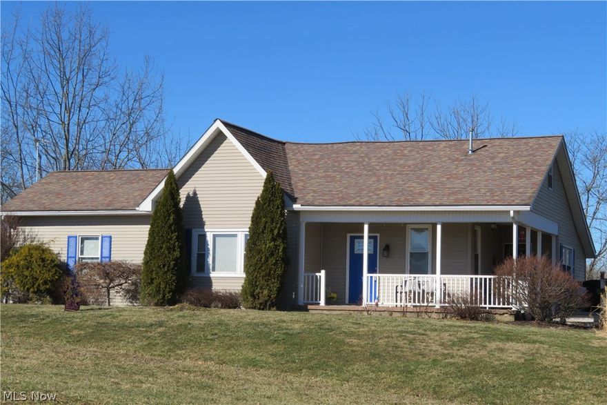 Looking for a peaceful, serene place to live? This is it! Enjoy your morning coffee with natural light in the bright kitchen, the covered porch, or the expansive 16 x 20 deck. This 4 bedroom, 2 bath home has been freshly painted, has new flooring, a totally renovated bathroom with new tile flooring, new vanity, new light, and a 46 inch custom tile shower. New 6 panel doors and a new 36 inch metal front door. The living room has new mini blinds and a new ceiling fan, There is a newer dishwasher and a new 16 x 20 deck off of the kitchen to enjoy the quiet, peaceful life of living here on 2.86 acres.. The 2 car detached garage and workshop is located across from the house and there is enough land next to it fo enjoy a garden or have some animals. The basement pool table stays.. The laundry room is on the main level. The dog kennel, the front room hutch, and the gas fire pit on the deck are reserved. The owners have received a letter about the possibility of public water being extended to