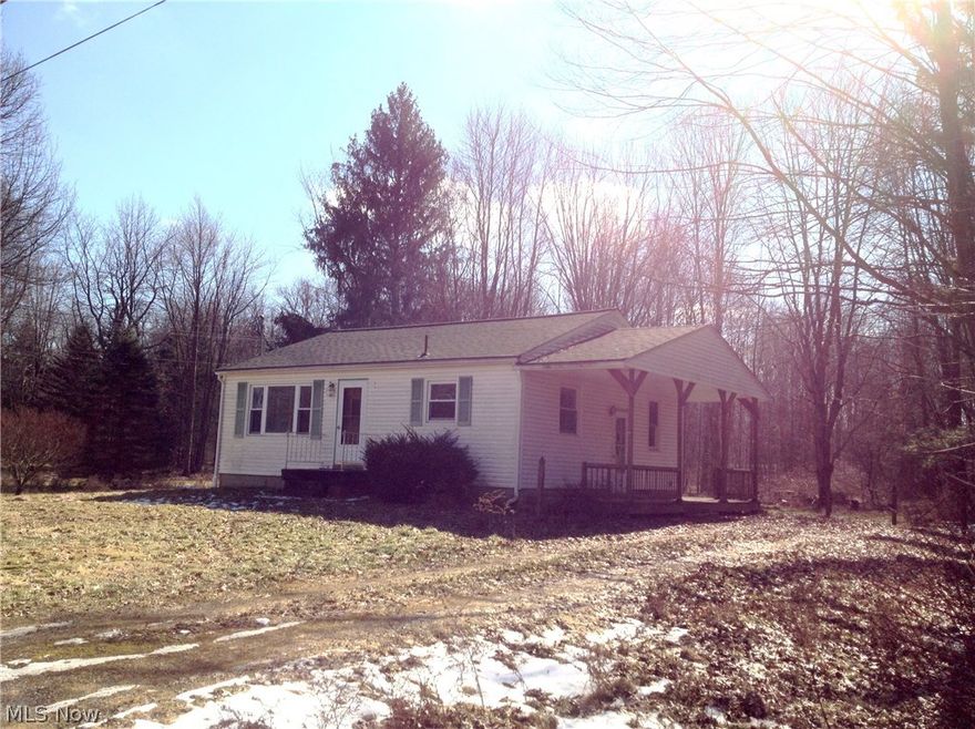 Vinyl sided ranch on 5 lots.  Home has newer roof, newer windows, porch/deck on side, hardwood floors in living room and bedrooms.  Sewer is coming to area/buyer responsible for septic inspection and and county required "band aid"