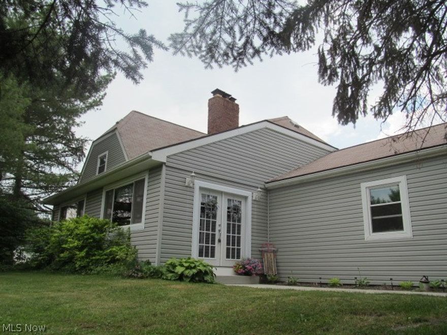 Welcome to 4637 Pioneer Trail! What a fabulous find! As you drive up the tree lined concrete drive to an expansive concrete entrance that connects the ample parking with TWO DETACHED full two-car garages and to the home with its own full two car garage... you realize... this is nice! This spacious home has privacy on a country setting yet close to town and only 30 minutes out of Cleveland! The open floor plan and generous living spaces will make this home the place to congregate and entertain. Not only room for family of all kinds but also a main floor laundry and master bedroom and master bath with jacuzzi tub for those wanting the one story lifestyle.

 Above one of the Garages is a full service additional suite with kitchenette, living room, bath and laundry! Whether it's needed for a family member, friend in need  or simply a man cave ... it is a great additional living space! This home has been updated with many new interior features such as flooring and  paint, plus new windows