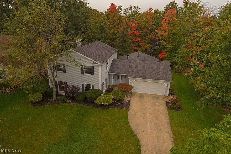 Move Right In!  This 4 Bedroom Colonial home features a ceramic tiled Foyer, Large Living Room, Formal Dining Room,Bathroom with ceramic tile and granite counter tops,Family Room with wood burning fireplace,Laundry Room, Great Room and Bonus Room with vaulted ceilings and Eat-In Kitchen with trey ceilings,ceramic tile, granite countertops, walk-in Pantry and stainless steel appliances and that is just on the Main Level!!! The Second Floor boasts a Master Bedroom, Master Bath with double sinks, granite counter tops, walk-in closet,ceramic tile shower and floor, 3 additional spacious Bedrooms with newer carpeting, Full Bath with granite and ceramic tile surround and floor.  The oversized Garage offers room for storage!  Relax on the deck (stained 2017) and enjoy the park like setting! The Community offers a clubhouse, tennis courts and heated pool! Other updates include dishwasher and microwave (2018),Carpeting (2017)Hot water tank (2016),Garage Door Opener (2015) Disposal (2014)