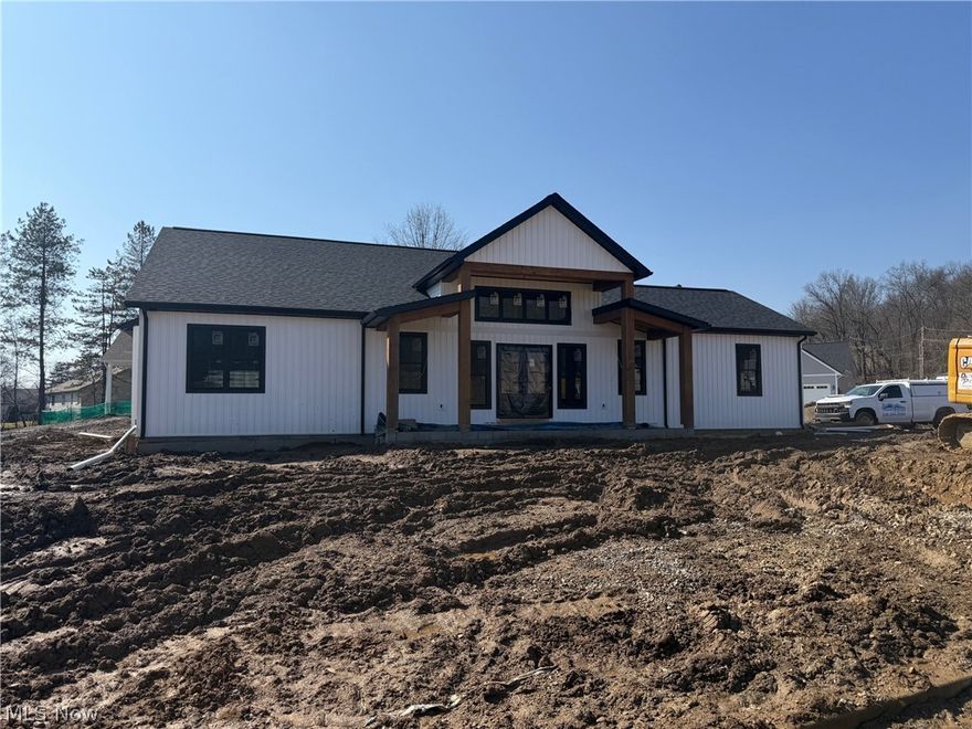 Brand new, quality built by Lawver Homes.  3 bedroom, 2 bath ranch home.  Large 2 story entry foyer fills the home with natural light!  Open floor plan with LVP flooring and recessed lighting.  Center island in the kitchen with access to rear deck.  Main floor laundry.  Split bedroom layout, giving privacy to the master suite which includes a walk in closet and full bath.  Double sinks are features in the master bath with walk in shower.  Full basement includes pre-plumbed drains for a third bathroom and is open for potential additional living space.  Prova exterior doors.  Excellent location in the hottest development in North Dover, Crimson Cove, just minutes from I-77, Dover Park and so much more.  Taxes reflect the land only.  Room sizes are estimates.