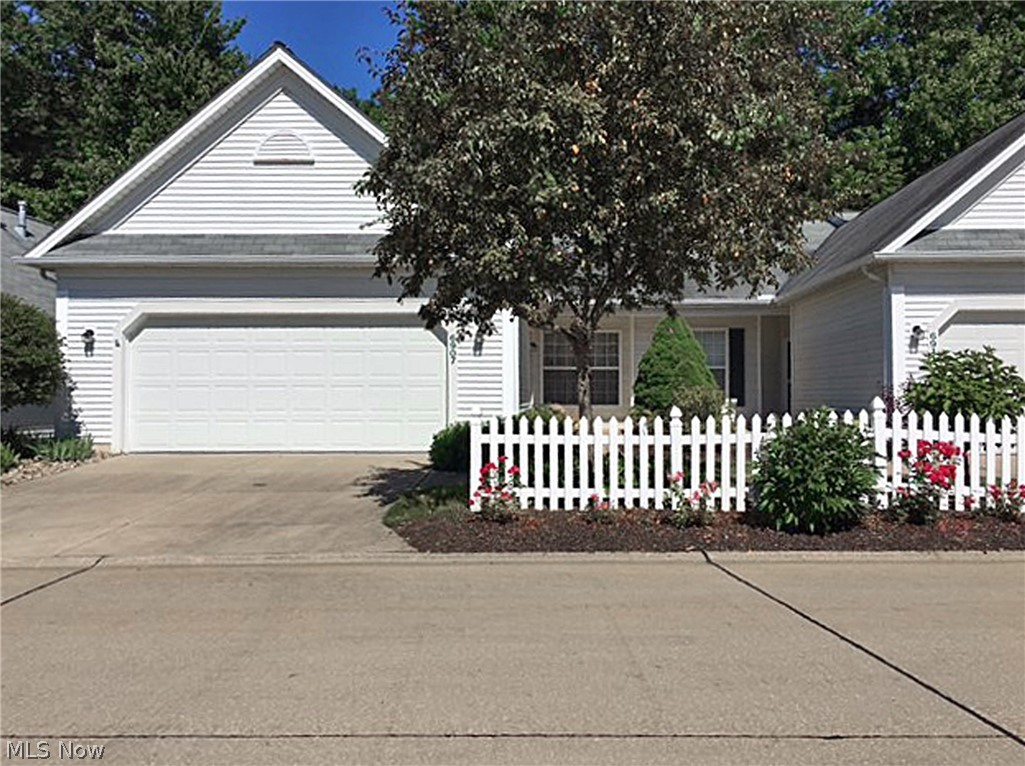 Come make this classy, comfortable, quality home yours today! Great location. One of the original Model Homes for the complex. The back has views of treed common grounds and a heavily wooded residential lot. Woodwork, crown molding, and doors are stained to match the Merillat oak cabinetry * Open Floor Plan * Two linen closets, coat closet, and pantry * 9'ceilings * Eat-in Kitchen with a window that views the front of the house & charming white picket fence, plus back patio views through a wall opening over the kitchen sink * All appliances stay * Ofc/Den/Crown Moldings/White Walls/Beige Carpeting, and French Doors * Many of the walls have been freshly painted * Pull-down Stairs To Garage Attic Storage * Spacious 22' x 20' garage with opener & hose water bibb * 16' x 8' Back Patio * Wired for cable * Alarm system wired for use * Beautifully flowered lilacs and tree hydrangeas * One cat OR one dog allowed * Move-in Condition * A one year Home Warranty is provided by the seller * This