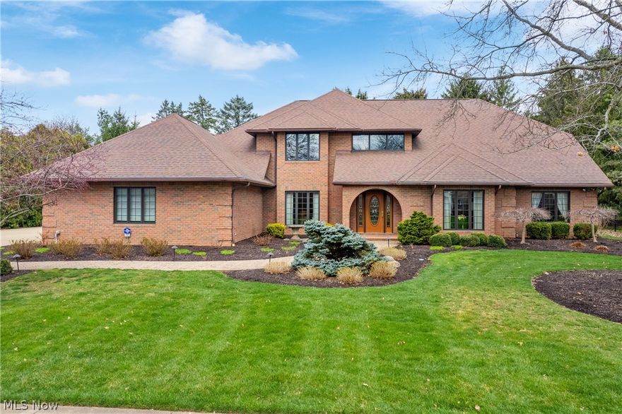 Welcome to 547 Meadow Lane in beautiful Wooster, Ohio. This home is located in a premier Wooster neighborhood: The Meadows. It is one of The Meadows' original builds and features a grand design, amazing quality, stunning architectural features, an all brick exterior, and nearly 7000 sq ft of finished living space. It has been meticulously maintained and gently lived in by all 3 owners who have occupied it. Centrally located, you are within minutes of all of Wooster's amenities including its vibrant downtown, excellent medical care, and plentiful shopping. This home has the conveniences of first floor living including a main level owner's suite and laundry. As you enter the home, you are greeted by a stunning 2-story foyer with marble floors and a curved staircase. Quality and beautiful features flow throughout the entire home. A huge kitchen with all of the amenities sits adjacent to a breakfast room and a 4-season sunroom, both with gas fireplaces. The owner's suite has a gorgeous tray ceiling, a walk-in closet, and a remodeled bathroom with a tile shower and a lovely custom built vanity. The living spaces include a 2-story great room, an additional living room near the entry way, a first-floor office, and a full finished basement that features a family room, recreation room, workshop area, and a bar. Also, an additional sleeping area with a renovated full bathroom rounds out the lower level. Upstairs, you will find two large bedrooms that both feature en suite bathrooms, walk-in closets, and bonus rooms.  The 3-car heated garage is oversized and accommodating. There is a recently poured stamped concrete patio in the nicely landscaped yard that has a gas line for your grill. Most of the HVAC has been replaced in the last few years and the all-brick exterior keeps outdoor maintenance to a minimum. Also, there is a whole home generator! You will feel this home's quality from the moment it comes into view as you drive up the road. Give us a call for more information.