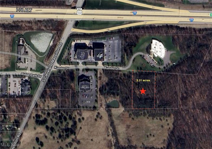 Perfect location to interstates and travel. Situated in a really nice business park and next to a prestigious Signatures of Fairlawn office building.  Would be perfect for medical building.  Can be zoned mixed use medical offices.  Great exposure on 21 and Kumho Drive.  Currently zoned residential but would be best suited for a zoning change and perfect for another office building.  Additional land available for sale.