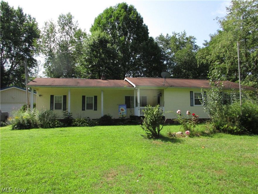 You will be pleasantly surprised to see all the features this former MFG home has been transformed and remodeled.  Close to Pymatuning lake, this beauty features a newly built oversize detached garage, a two story small barn all situated on 1.81acres.  Newer furnace, new water conditioner, new bedroom carpeting.   Sold furnished (except for a few small items) with all appliances.   Large family room with fireplace,  Covered front porch and covered deck in back.  Neat and clean and ready for year round or vacation dwelling.  This is a must see