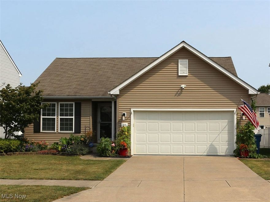 Welcome to this meticulous and spacious  ranch style home located in Martin's Run in Amherst. As you walk up the delightfully landscaped walkway, through the front door, you will see the open floor plan with vaulted ceilings and bamboo flooring offering comfort and beauty. This three bedroom, two full bath ranch with full finished lower level features an eat-in kitchen with stainless steel appliances, ample cabinetry and counter space that faces the high ceilings of the great room making it perfect for entertaining and family gatherings. Adjacent to the kitchen is the attached double car heated garage with hot/cold water supply perfect for the handy or crafty homeowner who likes to work year round inside & out. Conveniently located off the great room is the owner's suite with a walk-in shower, walk-in closet plus a built-in safe that stays with new owners. The remaining two first floor bedrooms, one of which is currently being used as an office, are located on the opposite side of the great room, allowing for privacy and convenience. The lower level is fully finished and well appointed with room galore! There is a 24x18 family room designed and located for TV viewing and relaxing. A 20x28 separate room is finished that is currently a fourth guest room with workout area complete with tanning bed. Lower level has roughed in plumbing for a full bathroom and is just waiting for the next owners. Laundry room is large & offers plenty of extra space for storage or workshop. Outside enjoy the completely vinyl fenced in backyard with a natural gas grill great for backyard barbecues or evening dinners. The yard requires little maintenance as the owners have given great care and nurturing to the beautiful flowers and raised bed gardens. They plan on passing it forward to whoever purchases in order to enjoy and nurture for time to come.....Conveniently located near SR 80 and 90 mins from Cleveland and Sandusky, marinas, shopping, medical facilities nearby, LCCC & Universities