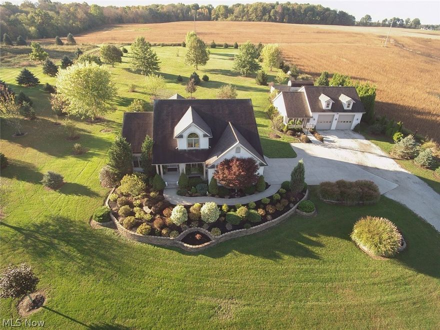 What is not to love in this stunning country home?  The beautifully built home by Ashley is sure to stun.  The vaulted ceilings as you step into the foyer and the fireplace and large windows give the home a spacious but cozy feeling. The first floor master suite features a large walk in closet and substantial master bath.  First floor laundry makes this home easy to manage.  The kitchen features beautiful Schrock cabinetry and updated appliances.  The bedrooms in this home are all generous in size.  The loft is a perfect place to hang out or make an office.  The basement has high ceilings and could easily be finished if you desired more space.  This home was built for entertaining and the large covered patio is a great place to have guests for a cook out or to relax at the end of a long day.  The gorgeous views make this home feel like a quiet country vacation.  This home has an attached 2 car garage and an additional multi-purpose building with over-sized garage bays.  The building is