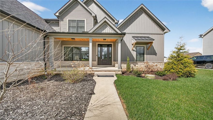 This exceptional Hinckley home blends thoughtful design and high-end finishes all within the highly desirable Highland School District. From the moment you step inside, the home feels both welcoming and sophisticated, highlighted by soaring ceilings, expansive windows, and a floor plan designed for effortless everyday living and entertaining.

At the heart of the home is the dramatic main living area, a statement fireplace and a chef-inspired kitchen designed for both style and function. Beautiful cabinetry, premium appliances, and generous workspace make this kitchen as practical as it is stunning. Just behind the main cabinetry, a hidden walk-in pantry offers additional prep space and abundant storage—perfect for keeping everything organized while maintaining the kitchen’s clean aesthetic.

The first floor also boasts an area easily used as a private office, den, or formal dining room.

The first-floor primary suite provides convenience of one-level living and serves as a true retreat, featuring a spa-like bath designed for relaxation and large walk in closet. Upstairs, a second private suite offers its own full en suite bath—ideal for guests, teens, or multi-generational living—while additional bedrooms are generously sized and thoughtfully arranged for comfort and privacy.

A finished walkout lower level expands the home’s living space even further, complete with a full bath and bedroom and ample room for recreation, a home gym, media space, or guest accommodations.

Outdoor living is just as impressive. A large patio provides the perfect setting for entertaining, grilling, or relaxing summer evenings, while the covered rear deck extends your enjoyment of the outdoors well into the cooler months.
Make this exciting home near the national park, shopping, and restaurants yours today.