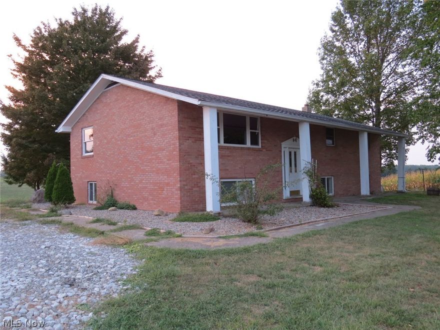 Selling at absolute auction on site on Sat. Oct. 10th at 10 am, 2.38 acres with brick bi-level home, church bldg., and 3 bedroom bungalow, all as a whole.
Property consists of 4 tracts served by 2 wells and 2 septics. Beautiful hilltop location with views all around! All structures have been well maintained and updated. Church bldg. has several potential uses. Call agent for info or to view!