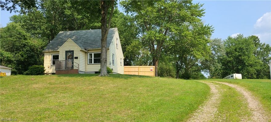 This adorable home is situated on a spacious lot in the Village of Rittman with the Martin Fritz Memorial Park right in its back yard!  4 bed, 1.3 baths bath (basement toilet). Bungalow style home with 2 bedrooms up, and 2 on main level, detached garage, mature trees, and plenty of room to roam!  Ready for a new owner, call today for your appointment to see!