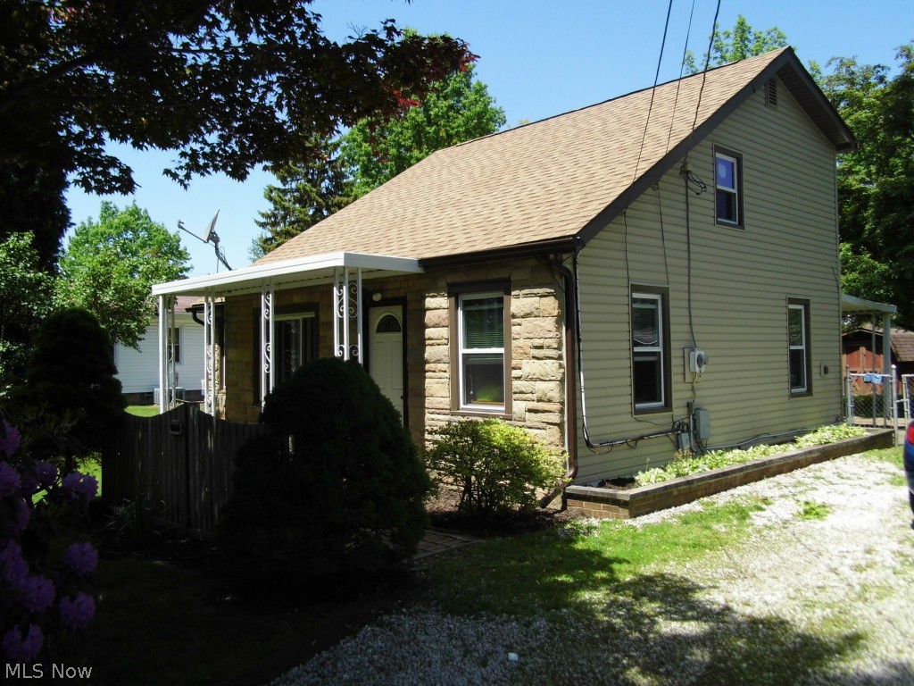 Updated 3 bedroom with 1 full bath home with Newer Roof, Newer Windows, Newer Vinyl Siding with stone accent, Newer Hot Water Tank, must see home close to the Park! This loved home has an awesome yard, rear patio, front porch and double driveway! Carpets were just cleaned to list and bright kitchen and dining area; this home features a 1st floor bedroom and laundry room (1st floor bedroom currently used as computer room / office). The home listing comes with a Home Warranty for Buyers Peace of Mind and the newer items make this a MUST SEE HOME! Great yard and close proximity to the park make this a great property! FHA Financing available as well as Conventional Financing and Cash Buyers welcome.
