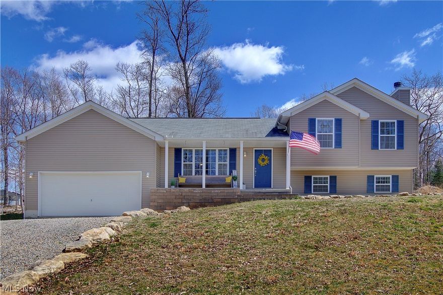 Attention all you HGTV Fans!  Here is your Chip and Joanna Farmhouse style home on just over an acre, right here in Tuscarawas County! From the moment you walk in, you will love all the natural light and openness of the kitchen and dining area! This completley updated home features 5 bedrooms total! A master with his and her closets and master bath, 2 bedrooms on main living area, and 2 additional bedrooms in the lower level. The great room is large and super cozy with fireplace, and more natural light. From there you will love the huge laundry room, which you can also make into a playroom or office! Too many updates to list, fresh paint and flooring in every room, shiplap added, new stairs and railing, and so much more. You do not want to miss this little piece of paradise on an acre in Tusky Valley Schools! So much room for you to grow.... Not to mention, just a short drive to Atwood Lake. Will not last long, be sure to call to schedule your showing today!
