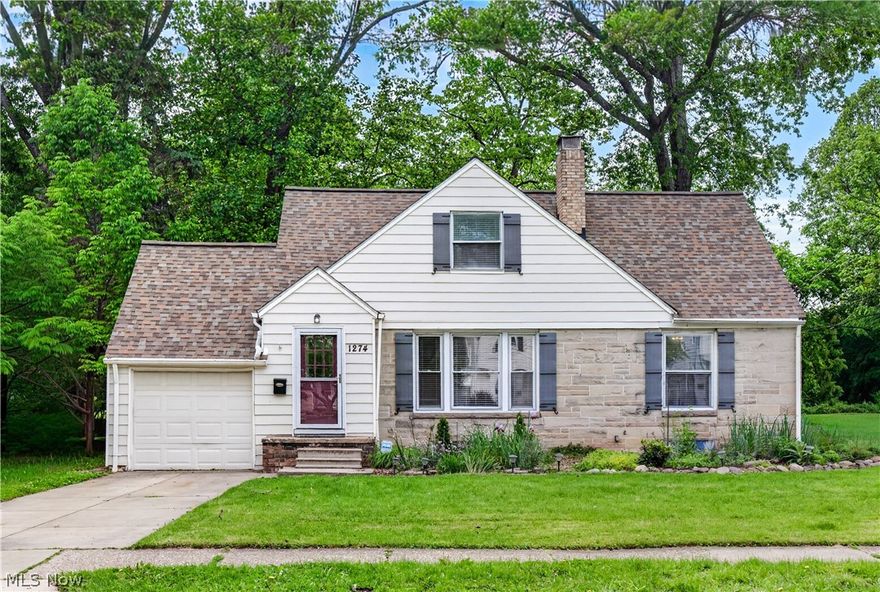 This charming 3BR 2BA home in S Euclid sits on a park-like yard with a stream running through the back of the property.  A quiet place to enjoy coffee in the morning and relax in the evening after a long day.  The living room provides a cozy feel with its recessed lighting, a fireplace for chilly days and built-ins for storage. Adjacent is the full dining room, which has plenty of space for dinner parties and its own built-in cabinet  Off of the living room is the colorful kitchen on one side and a screened-in porch on the other. There is a full bath and two nicely sized bedrooms on the first floor.  One with an 8 foot picture window that allows much natural light and scenic views.  The second floor includes a bedroom with recently installed skylights for increased natural lighting and a second room that can serve as a dressing room or office.  The second full bathroom, which includes a closet, is also on this floor.  Recent years have brought many updates, including a newer roof with a 50 year warranty (2019); electrical box (2018); hot water heater (2023) and a front garden with many native plants and ornamentals designed to attract pollinators and provide natural beauty.  The seller is providing a one-year home warranty for peace of mind.  This home is centrally located near many shops and restaurants, and it's only a quick drive to University Circle, the Cleveland Clinic, CWRU and all of the cultural amenities that area offers.