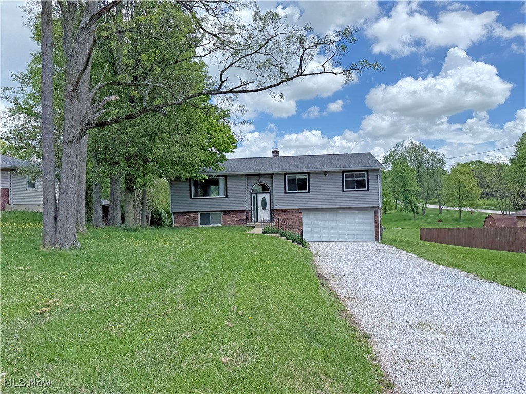 Make this Northfield property your own and enjoy life at the doorstep of Cuyahoga Valley National Park. This bi-level home has been recently updated and freshly painted. The main floor features an open floor plan with a living area, a full bathroom, two bedrooms, and a primary suite with a half bath. The lower level includes a finished den, a utility room with laundry, and a covered​​‌​​​​‌​‌​​​‌‌​​​‌‌‌​​‌​​‌‌​​​​ patio.
