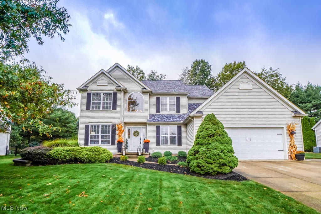 Nestled in the Robins Trace neighborhood within Green Local Schools, this welcoming colonial home has everything you've been searching for! Step into the bright two story foyer with hardwood floors and plenty of natural light. The great room, featuring a cozy gas fireplace, flows seamlessly into the dinette and kitchen, which boasts granite countertops and newer stainless steel appliances. A formal dining room sets the stage for holidays and special occasions. French doors open to a home office, ideal for a quiet workspace, playroom, or den. The first floor laundry room, complete with a utility sink and folding counter, along with a half bath, provides added convenience.
Upstairs, the master suite offers a private retreat with a walk-in closet, jetted tub, new flooring, separate shower, and double sinks. Three additional bedrooms, all with spacious closets, share an updated hall bath. The finished basement provides extra living space, including a rec room, exercise area, and plenty of built-in storage, with even more storage available in the attached two car garage. Outside, the large deck extends to a fully fenced backyard, making it ideal for gatherings or play. This well maintained home features a brand new roof and a fantastic location in a great neighborhood, conveniently close to all amenities. Don't miss out, call today!