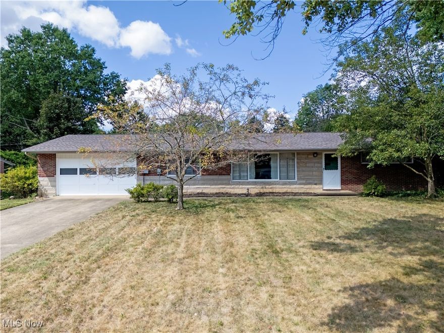 Nestled in the heart of the sought-after North Canton school district, this inviting 3-bedroom, 2-bathroom brick ranch offers the perfect blend of comfort, space, and potential. Ideally located just minutes from downtown North Canton and major highways, this home is perfect for commuters seeking easy access while still enjoying the tranquility of a quiet neighborhood.
You’ll love the spacious, open-concept living and dining area, where large windows flood the rooms with natural light, creating a welcoming atmosphere for family gatherings or quiet relaxation. Beautiful hardwood floors throughout provide a timeless foundation, ready for your personal touch.
The front yard offers great curb appeal, while the private, naturally secluded backyard presents a fantastic opportunity to create your own outdoor retreat. Whether you’re dreaming of a garden, a patio, or simply a peaceful escape, this space is ready for your vision.
An attached two-car garage with ample storage ensures convenience and organization, making it easy to keep your home clutter-free.
This home offers exceptional value in a prime location. Don’t miss the chance to make this property your own in one of North Canton’s most desirable neighborhoods!