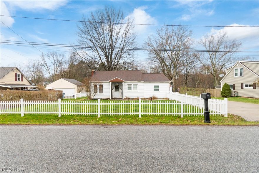 Check out this beautifully updated ranch home in Springfield Twp!  Head inside to find a large living room, eat-in kitchen, office, laundry/mud room, spare bedroom, full bathroom, and a MASTER SUITE w/it's own large attached full bathroom. Large covered deck overlooks the over half acre fully fenced in yard. Detached 2 car garage w/2 ton lift and finished space in the rear that can be used as workshop or office space. Extra wide paved driveway. Water heater, HVAC, well, and septic all less than 8 years old. Schedule your private showing today!