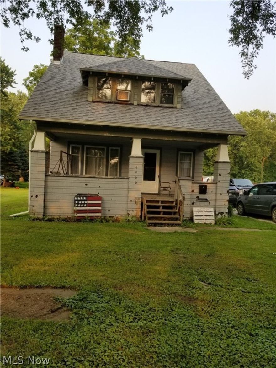 Buckeye colonial. 4 bedrooms, natural woodwork and wood floors. Owner has started renovation. Remodeled bath, some electrical, newer roof, and most windows replaced. Living room has fireplace and dining room has window seat. Newer sliding door to back yard. Some leaded windows, Not a drive by.