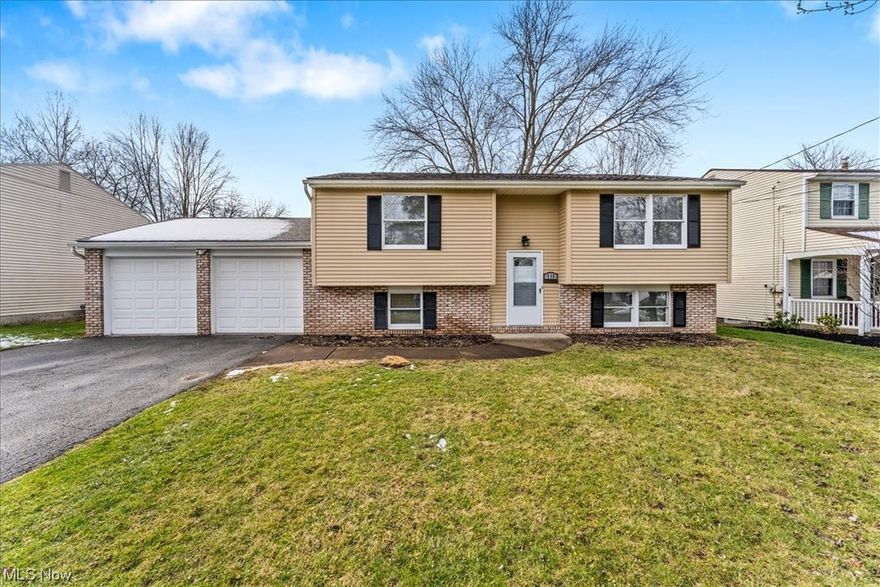 McDonald house on a dead end street! Are you looking to live in a great neighborhood with a fenced in back yard? Look no further this updated house with brand new windows flooring and painting will help you to get to enjoy life instead of doing repairs. Featuring two bedrooms up stairs and two bedrooms on the main level you will have no problem finding places for all your family to sleep. When you have a full bath for each set of rooms your getting ready time will be cut in half in the morning. This house features two living rooms also. So when dad wants to hog the TV watching his boring shows, everyone else has an outlet to go watch the shows they wish to watch! Laundry on the main floor, with access to the garage and back yard from there. If you are looking to get some sun in the colder months there is a heated sunroom porch off the remodeled kitchen. Hurry in today and see what your possibilities are of owning your own home!