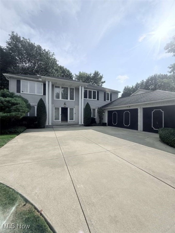 Welcome to this beautiful move-in ready colonial located on the highly desirable Woodhawk Drive! This home is nestled on the perfect property for privacy at a dead-end street past the condos. Open the front door into the beautiful 2 story foyer. The first floor features a large, bright eat-in kitchen with granite counter tops which leads into the open family room with fireplace. The sunroom will have you enjoying the scenery all year round from the wall-to-wall sliding doors and 4 sky lights. The large formal dining room flows into the living room which is perfect for all entertaining! First floor room with closet can be used as bedroom/office or anything you desire. Laundry room and half bath complete the stunning first floor. The second floor greets you with 4 spacious bedrooms. Open the double doors into the generously sized master bedroom featuring a huge full bathroom as well as a beautiful all mirrored walk-in closet. Another full bath completes the second floor. The large, finished basement boasts a half bath as well as built in bookshelves and cabinets. Retreat to the private fenced in backyard featuring a large deck and patio. The three-car garage provides ample space for vehicles, storage etc. Other features include alarm system, sprinkler system and shed.