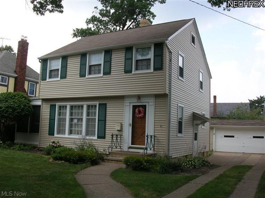 This lovely home is walking distance from Kamms Corner. With neutral colors throughout, it's ready to move in. Home has new vinyl siding and insulation (2008). Living room has decorative fireplace with marble surround. Wood flooring in living and dining rooms. Dining room has spacious built-in corner cabinets. Eat-in kitchen has been updated and has a bay window overlooking the back yard. Master bedroom is open and bright with wood floors. The bathroom vanity and floor were updated in 2004. Basement has carpeted rec room with pine walls, a laundry area, half bath+shower, and two storage rooms. Walk up attic, with new insulation in 2005, is great for storage. Enjoy the enclosed porch, updated in 2013, during warmer weather. Close to I-90, I-71, Metroparks, schools, grocery, bars/restaurants, and a​​‌​​​​‌​‌​​​‌‌​​​‌‌‌​​‌​​‌‌​​​​ playground.