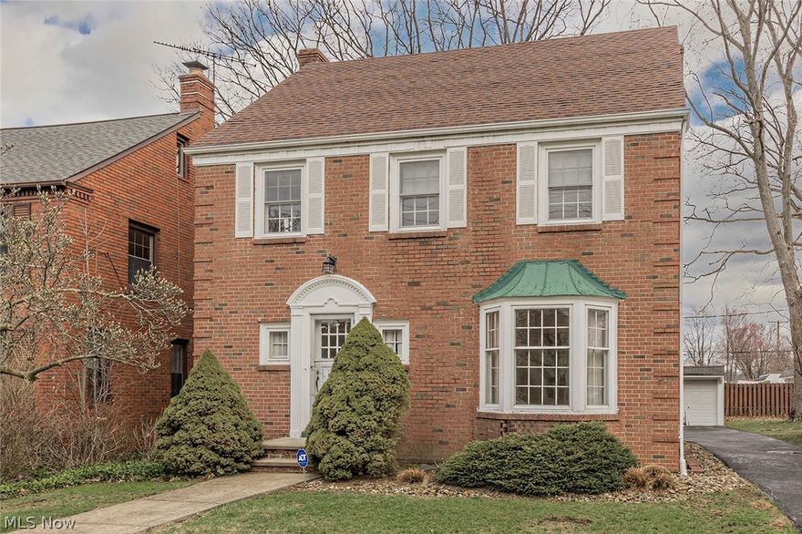 Solidly built 4 bedroom 2.5 bath brick colonial in great University Heights location! Hardwood floors in living, dining rooms and all 4 bedrooms. Breakfast room between kitchen & dining room. Recreation room with fireplace in basement. 90% efficiency furnace installed in 2017. Electrical breaker box replaced in 2022. Ohio State Waterproofing done in 2017 with transferrable warranty. Mold remediated in 2022. Back porch to enjoy in summer months. Buyer to assume city violations and escrow requirements.