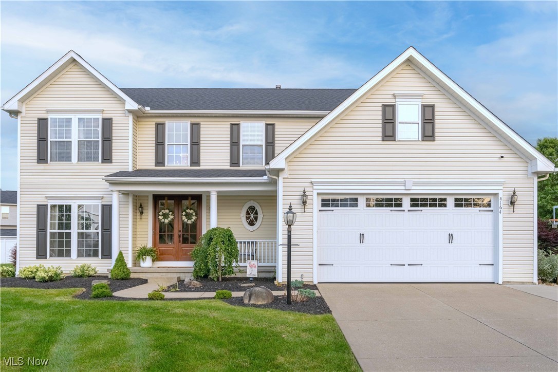 Welcome to this stunning four-bedroom, three-and-a-half-bath home nestled on a peaceful cul-de-sac within the desirable Green School District. Built in 2005, this home offers just under 3,500 square feet of meticulously maintained and thoughtfully updated living space. As you enter, you’re greeted by a bright two-story foyer with beautiful vinyl wood flooring that extends into the spacious kitchen and eat-in area. The kitchen is a chef’s delight, featuring granite countertops, abundant cabinet space, and brand-new appliances, perfect for both everyday meals and entertaining, as well as a morning room perfect for enjoying meals. On the main level, you’ll also find a convenient first-floor laundry room and mud room, a conveniently placed powder room, and even a first floor office space with beautiful Arhaus bookshelves. The spacious living room, flooded with natural light, features a cozy gas fireplace, perfect for relaxing evenings. Upstairs, you’ll find generously sized bedrooms, including a luxurious primary suite with a generously sized walk in closet. The finished basement offers additional living space and includes a full bathroom, making it a versatile area for guests or recreation. Egress window already installed for comfort. Plenty of storage space in the unfinished side of basement. Step outside to your backyard oasis, where you’ll find a stamped concrete patio area with a gas fire pit, perfect for entertaining. The low-maintenance inground saltwater pool with an automatic cover is PERFECT for the warm summer months, with a fenced already installed. Recessed landscape lighting, and a built-in basketball hoop make this backyard truly special. The driveway widens to offer additional parking space. Conveniently located close to shopping, freeway access, and other local amenities. With almost every detail thoughtfully considered, this home is move-in ready and waiting for its new owner. Don’t miss out—call today to schedule your showing! This one will not last