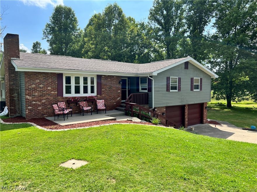 If your looking for privacy, look no further.  Four bedroom home with 3 full baths sitting on 4 acres.  Three season sun room off the back of home surrounded by deck area for lounging.   Built in pool with pool house and large deck area.  Oversized two car detached garage with its own driveway along with the two car garage attached to house.