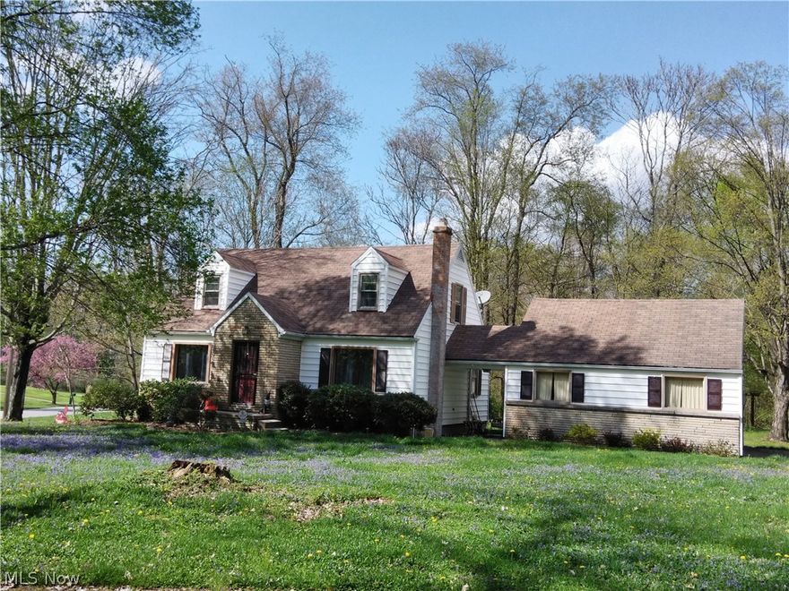 Pictureesque setting  ins this beautiful Cape Cod  overlooking Mill Creek Park, spacious open space,   Open concept Living rm Dinindg room with foyer entry, hardwood floors  newly remodeled  white kitchen cabinets with pantry with stainless appliances. First floor Master, Full basement with laundry washer & dryer staying, breezeway patio and two car garage.