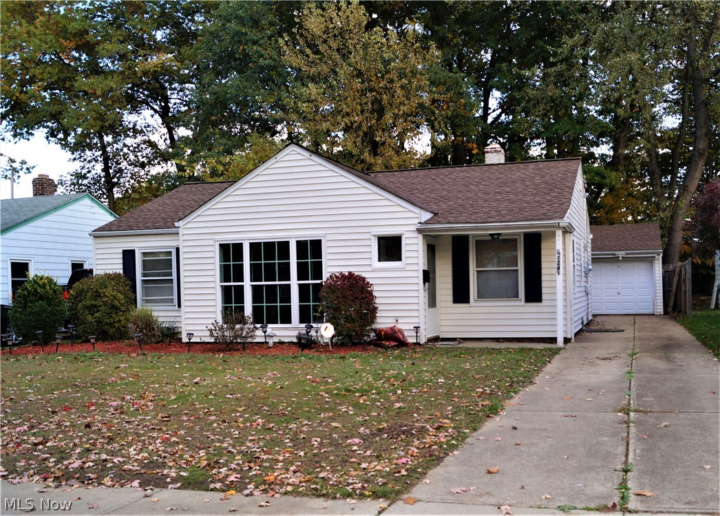 A pretty cottage set on a quiet street near the heart of the action in Mayfield Heights is ready to be your Home for the Holidays! As charming once in the front door as it is from the curb, a newer expanded kitchen, flooring, carpeting and fresh paint are just the inviting modern touches that this sweet character home has to make it a winner!. Generous living space, laundry adjacent to the kitchen, new roof on the house and garage just last year (with a 25 year transferable warranty), a 2 year old Rheem H2O tank and a boiler installed in 2013 make it safe and solid inside and out, along with an enclosed patio to lend to more entertaining opportunities, just in time for lots of festivities! Within a mile of retail, public transportation, entertainment, I-271, and less than 2 miles from Hillcrest Hospital. Home warranty included. It's an amazing value for an even more amazing price! Call and take a look soon!