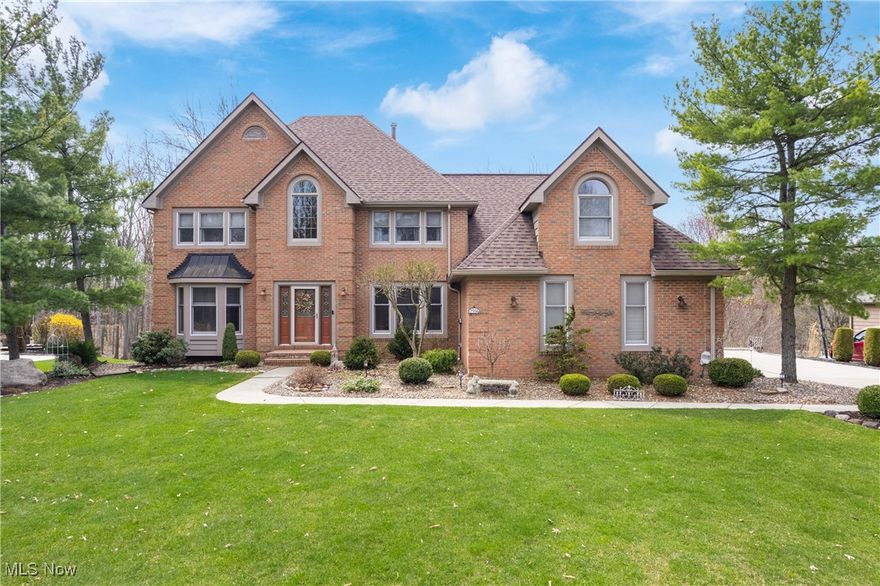 Views, an in-ground pool, and a beautiful home—what more could you want? This stunning colonial is located in the highly sought-after Canyon Creek neighborhood in Hinckley Township. It offers 4 bedrooms, 2 full and 2 half bathrooms, with 3,206 square feet on the main floors and an additional 958 square feet in the walk-out basement. The main living floor features a gorgeous kitchen with endless counter and storage space, complete with granite countertops. You'll also find a formal dining room, a sitting room, and an office space that could easily be converted into a massive walk-in pantry. The living room includes a cozy gas fireplace and opens to a covered porch with absolutely breathtaking views. Upstairs, you'll find all four generously sized bedrooms, including a luxurious primary suite that truly speaks for itself. The walk-out basement includes a convenient half bathroom just off the sliding door—perfect for entertaining. Step outside to the 16x32 heated, in-ground saltwater pool with a liner that's been meticulously maintained. At the rear of the 0.75-acre lot, there's a picturesque winding creek. The roof was replaced in 2023, offering peace of mind for years to come. This home must be seen to be fully appreciated—don’t miss out on all it has to offer!