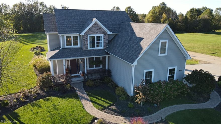 This custom home is move in ready! 4 bedrooms plus a bonus room with 2.5 baths on 2 acres. The entrance boasts a bright 2 story foyer with wood flooring that extends into the dining area. The living area includes a beautiful stone fireplace and lots of room to relax. Upstairs you will find 4 bedrooms and a bonus room area off the master bedroom perfect for a sitting or workout area.  The eat in kitchen includes all appliances. The unfinished basement is plumbed for an additional full bath and also includes a newer tankless water heater . Outside amenities include a large yard for entertaining and a deck with pergola. Call today to schedule you private showing, this one won't last!