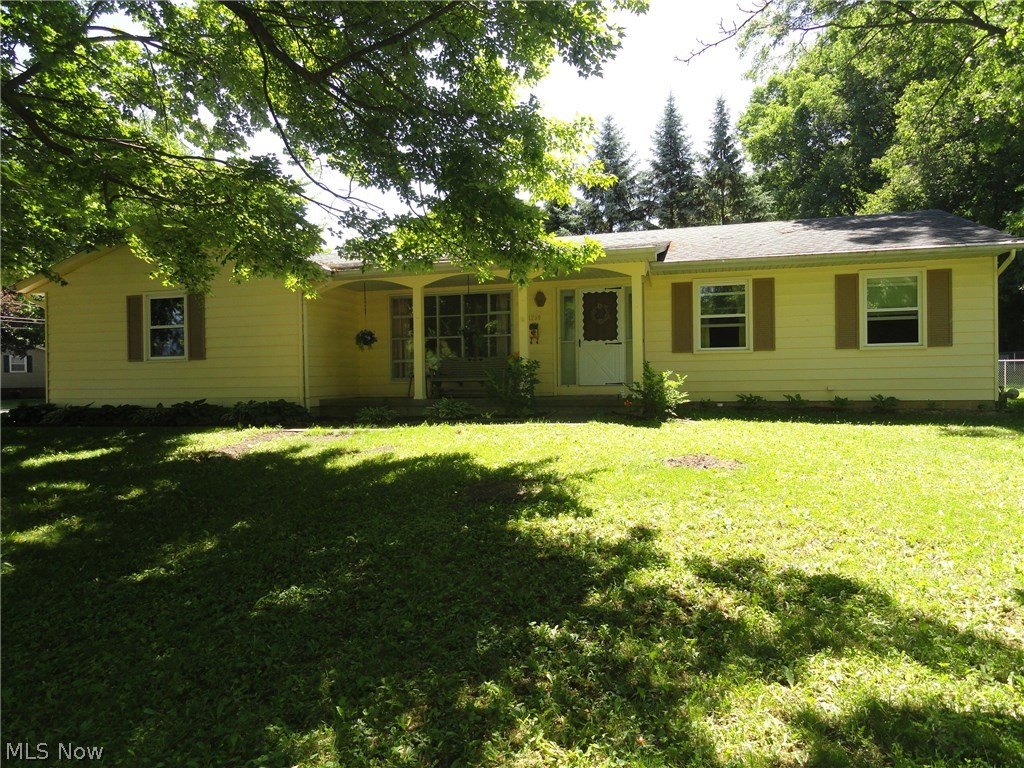 Lovely Ranch on large corner lot in quiet Stow neighborhood. Very well maintained and super clean throughout. Foyer entry, spacious living room with large picture window brightening the room. Impressive open floor plan encompasses the kitchen and dining room which overlooks the cozy family room with brick fireplace and sliders to the patio. Kitchen offers plenty of cabinets, newer appliances and gleaming laminate floor that continues into the dining room. Three bedrooms and two full baths. Private bath in the master bedroom. Two bedrooms have hardwood floors. Full basement offers storage space plus extra rooms creating more living space. The HVAC was replaced in 2013 approx. Also the windows, roof, sliding door and water heater have been updated. Two car attached gargae plus a large shed. Neutral decor throughout is just one more plus in this very pleasant home.