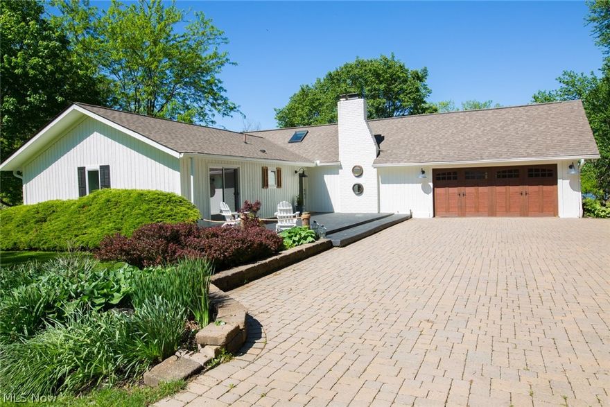 Wake up to awe-inspiring lakefront views of Hoover Reservoir! Driving up the long paver stone driveway, you'll immediately appreciate all 1.4 acres of sprawling, green space this 4 bedroom, 3 bath home has to offer. The open kitchen features a subzero refrigerator, marble waterfall island & butcher block countertops. If the West facing wall of brand new doors & windows isn't enough of a view, look up to the skylight for even more blue sky. Full mother-in-law suite w/ kitchen & bath in walkout lower level lead to a hot tub and bbq area. Great outdoor living spaces, screened in porch & balcony w/ spectacular views of the lot and water. Just 15 minutes to Easton, New Albany & Polaris, it's obvious why this stunning home has earned it's title as Red Bank Retreat! Check out the video!!