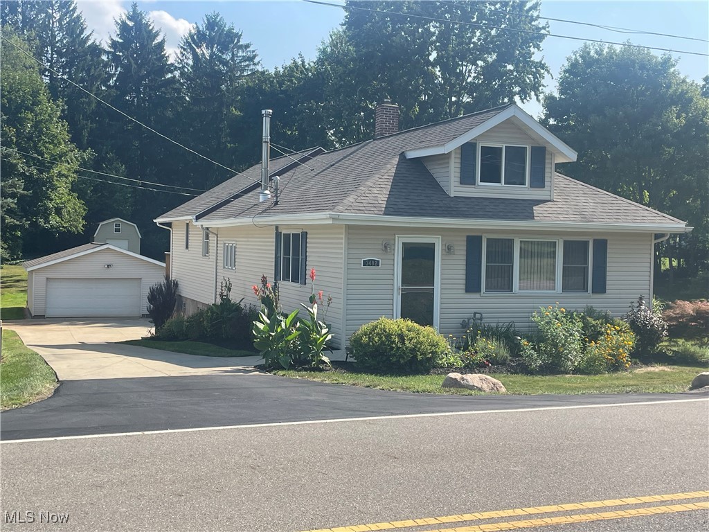 Here's your chance to own a meticulously kept 3 Bedroom, 2 Bath Raised Ranch with an additional 1/2 acre parcel! This home features a huge living room with a wood burning fireplace, a nice kitchen with lots of counter space (includes the refrigerator, range, dishwasher and microwave), a large master suite with walk in closet and sliding glass doors leading to cozy deck! The basement is partially finished with a 22' x 23' Rec Room which comes complete with a pool table, kitchen cabinets with sink and a TV/seating area for watching all your favorite sports teams (Great "MANCAVE"). The outside is just as Amazing! The large concrete driveway leads to a 2 1/2 car detached garage with electric and a garage door opener. You'll find a 16' x 12' storage barn at the rear of the property and additional parking near the road on the included additional parcel. Updated 100 Amp service panel, Roof, Furnace & A/C were replaced in 2018. Peaceful, country living vibes just minutes from S.R 21! Come see for yourself!